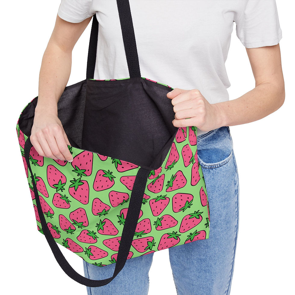 Thumbnail: Fresh Strawberries Weekender Bag - Person opening the bag, showing part of the inside, which is black.