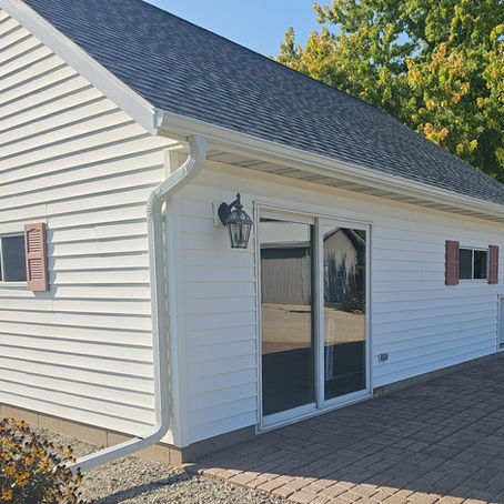 New seamless gutter installation on a residential home in Green Bay Wisconsin