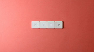 HTTP spelled with keyboard keys on a pink background, minimalist style.