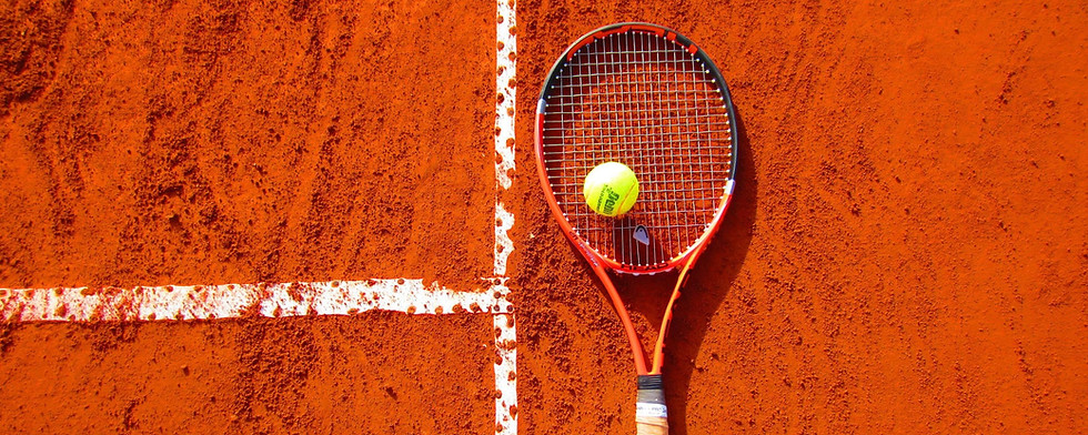tennis-racket-and-ball-on-the-soil-tennis-court-wallpaper