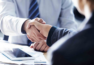 AdobeStock_175862697_HandshakeSM-720x500