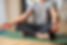Young man doing gyan mudra symbol and meditating at home.jpg