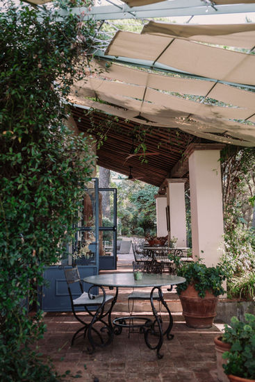 Outdoor cafe seating and tables, seaside wedding at Borgo dei Santi, riccardopieri