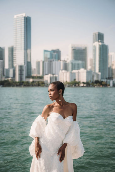 Bride looking toward the horizon with Miami Bay behind her.