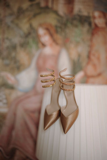 Elegant bridal shoes detail during wedding preparations