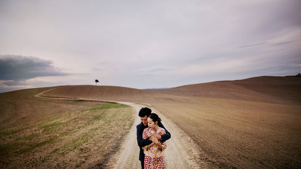 Destination wedding couple portrait Tuscany golden hour