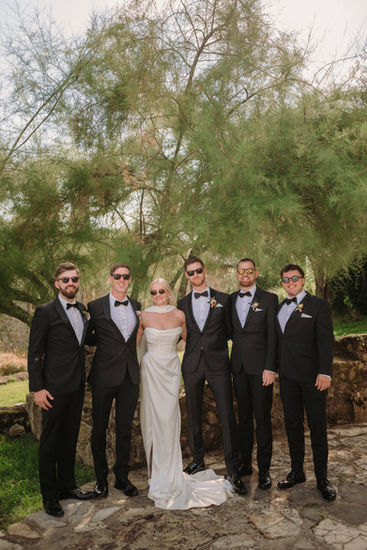 Bride with groomsmen in sunglasses; Jessica and Liam Tuscan wedding; formal attire.