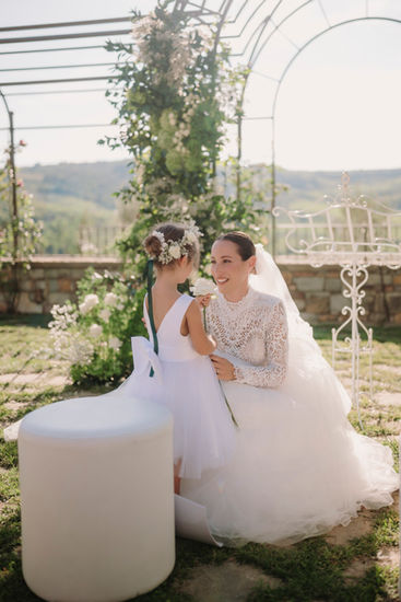 Brides smiling at each other during Sharon and Marco’s Elegant Wedding at Vignamaggio