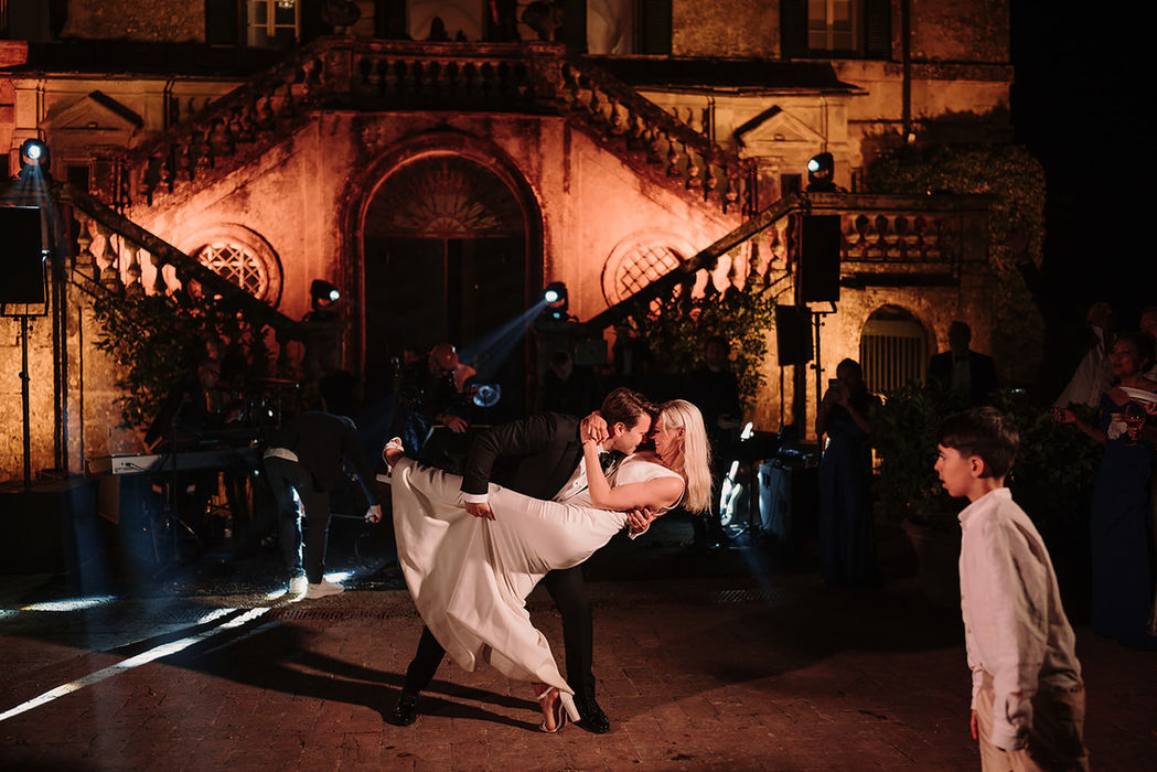 Newlyweds first dance in stone hall at Villa Cetinale, wedding photographer Riccardo Pieri Tuscany