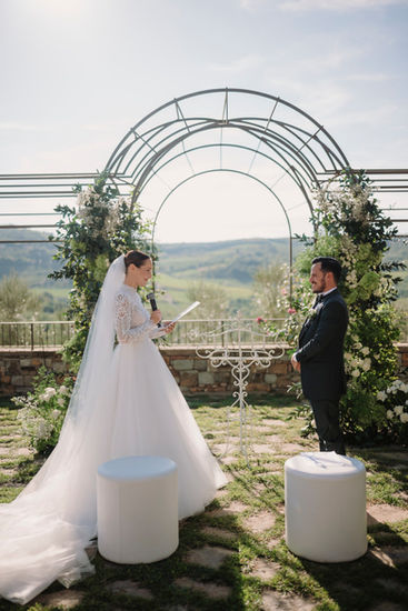 Bride and groom at altar during wedding ceremony, Elegant wedding at Vignamaggio