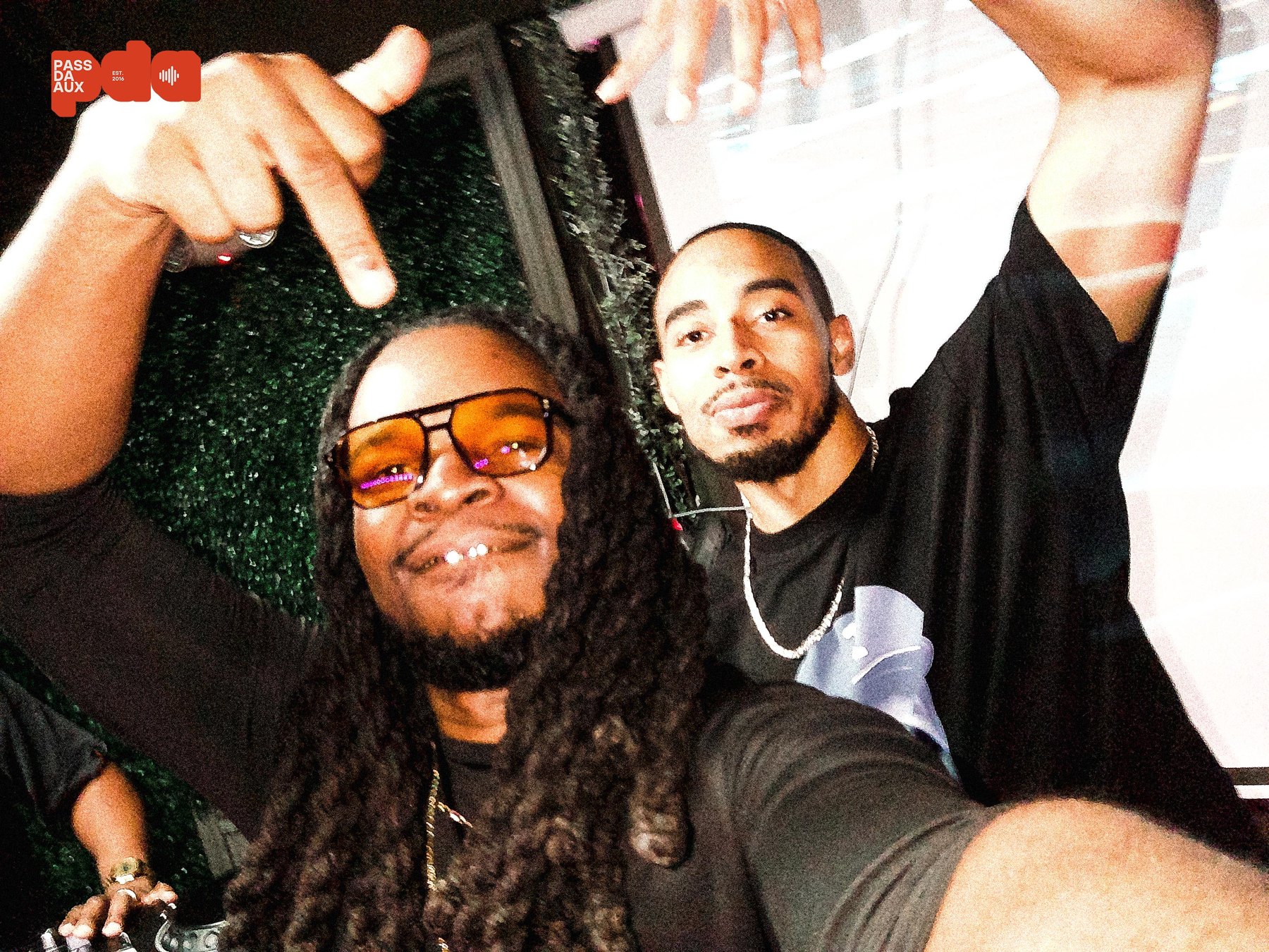 Guests taking a Fan Cam photo at Pass Da AUX