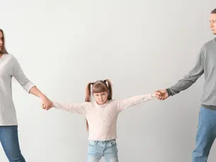 Pennsylvania judge reviewing child custody factors and legal documents in family court proceeding