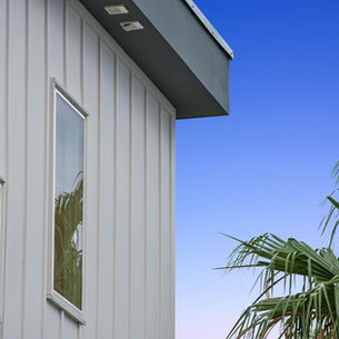 Fiber cement siding installation on Western PA home showing durability against climate conditions