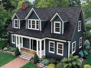 Cape Cod style home with an Owens Corning Evergreen Mist shingle roof near Pittsburgh