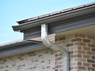 Pittsburgh roofing contractor replacing damaged fascia boards on a residential home in Allegheny County