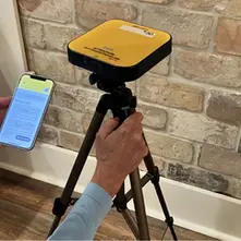 Radon gas testing in a Pennsylvania home with canister placed in Pittsburgh-area basement