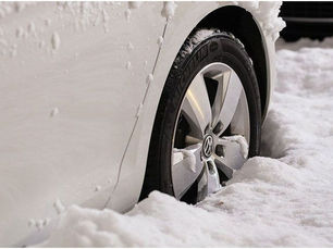 Car being cleaned at touch-free car wash to protect from winter weather damage in Western Pennsylvania