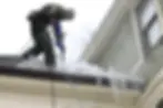 Professional roofer installing new roof showing how long does new roof last Pittsburgh with quality materials