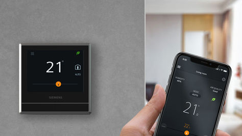 Smart thermostat benefits displayed on modern digital interface showing energy savings and temperature control for Somerset PA homes