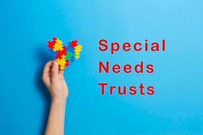 Estate planning attorney in Greensburg PA reviewing a special needs trust document with a Westmoreland County family