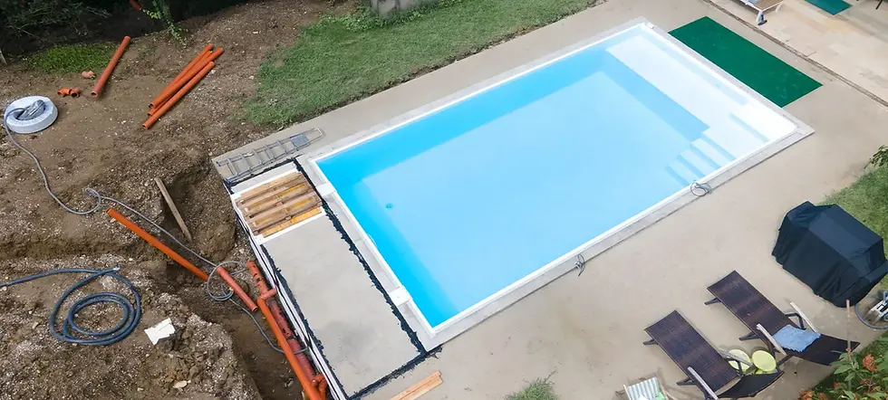 Finished concrete pool deck installation in Pittsburgh PA with stamped border and smooth surround surface