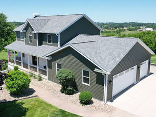 Pittsburgh-area home with ProVia vinyl siding and an Owens Corning architectural shingle roof