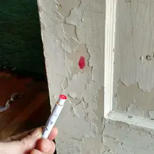 Certified inspector conducting lead paint testing in a Pittsburgh Pennsylvania pre-1978 home