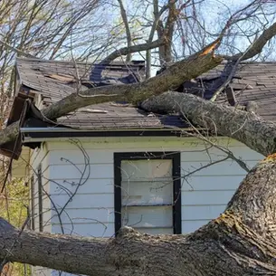 Emergency roofing services storm damage repair on Westmoreland County residential home