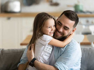 Parent and child reviewing relocation documents with a family law attorney in Greensburg PA during a custody dispute