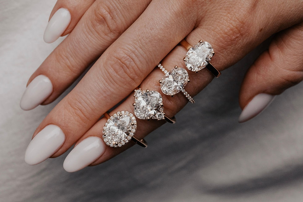 Custom engagement ring with oval diamond and vintage-inspired setting designed at Brian Nicklaus Jewelry in Greensburg PA
