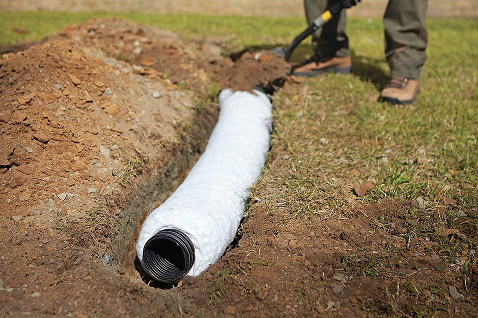 French drain installation around a block foundation home in North Huntingdon PA by A Better Choice Inc