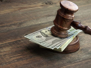 Attorney reviewing a spousal support case with a client in a Greensburg PA law office