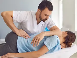  Patient receiving their first chiropractic appointment at Barto Family Chiropractic in Monroeville PA
