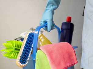 Professional deep cleaning service team scrubbing kitchen surfaces in a Greensburg PA home