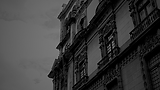 Dark Minimalist Old Building Quote Calendar Desktop Wallpaper.png