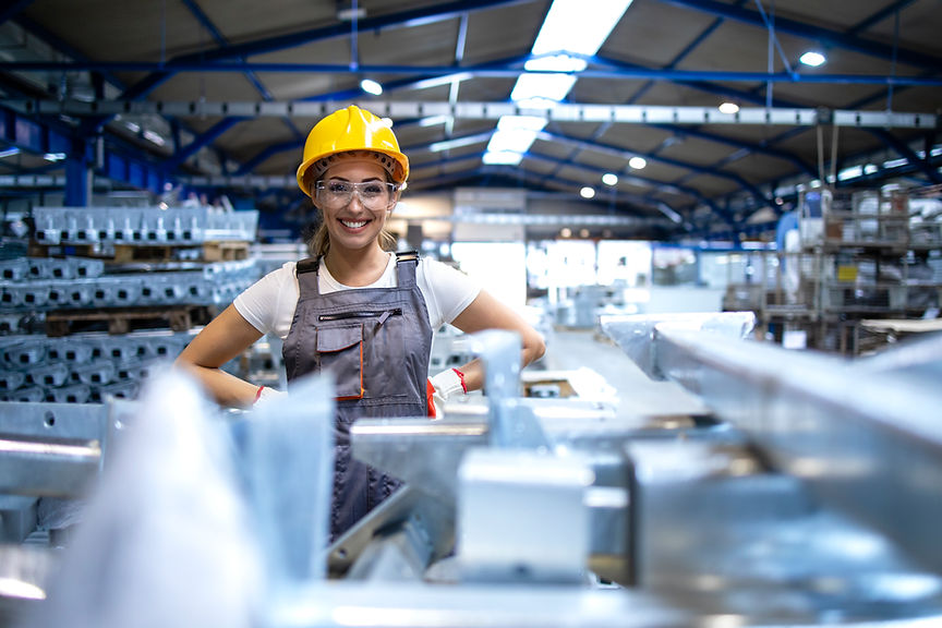 portrait-female-factory-worker-standing-production-hall.jpg