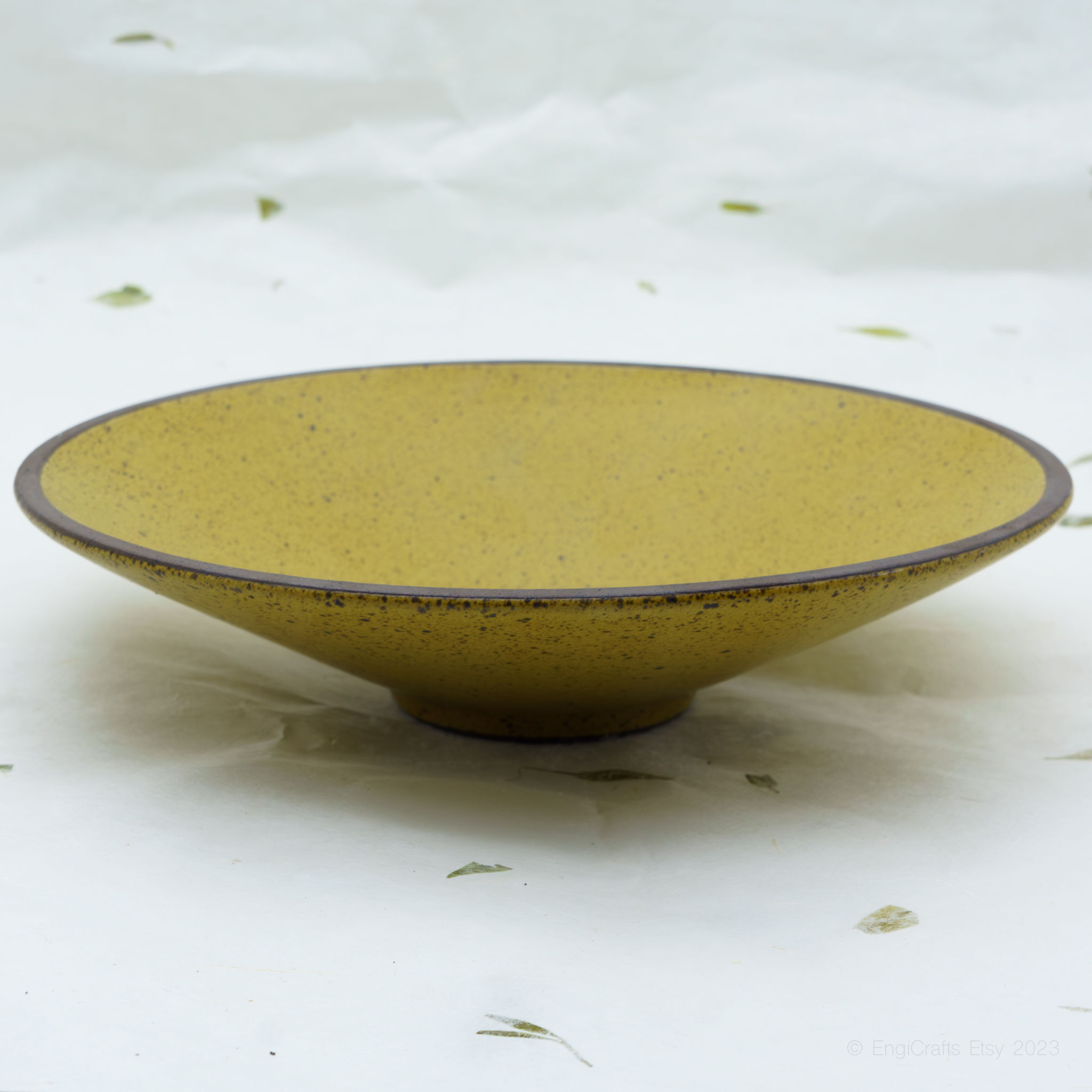 Yellow ceramic deep plate by EngiCrafts with a rustic matte finish, perfect for pasta, soup or salad. Durable and versatile.