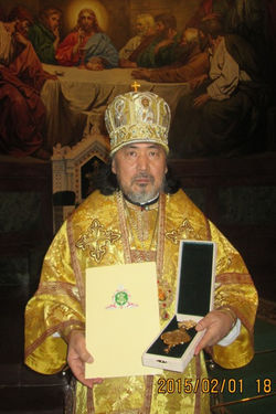 着座15周年祝のパナギヤを手に