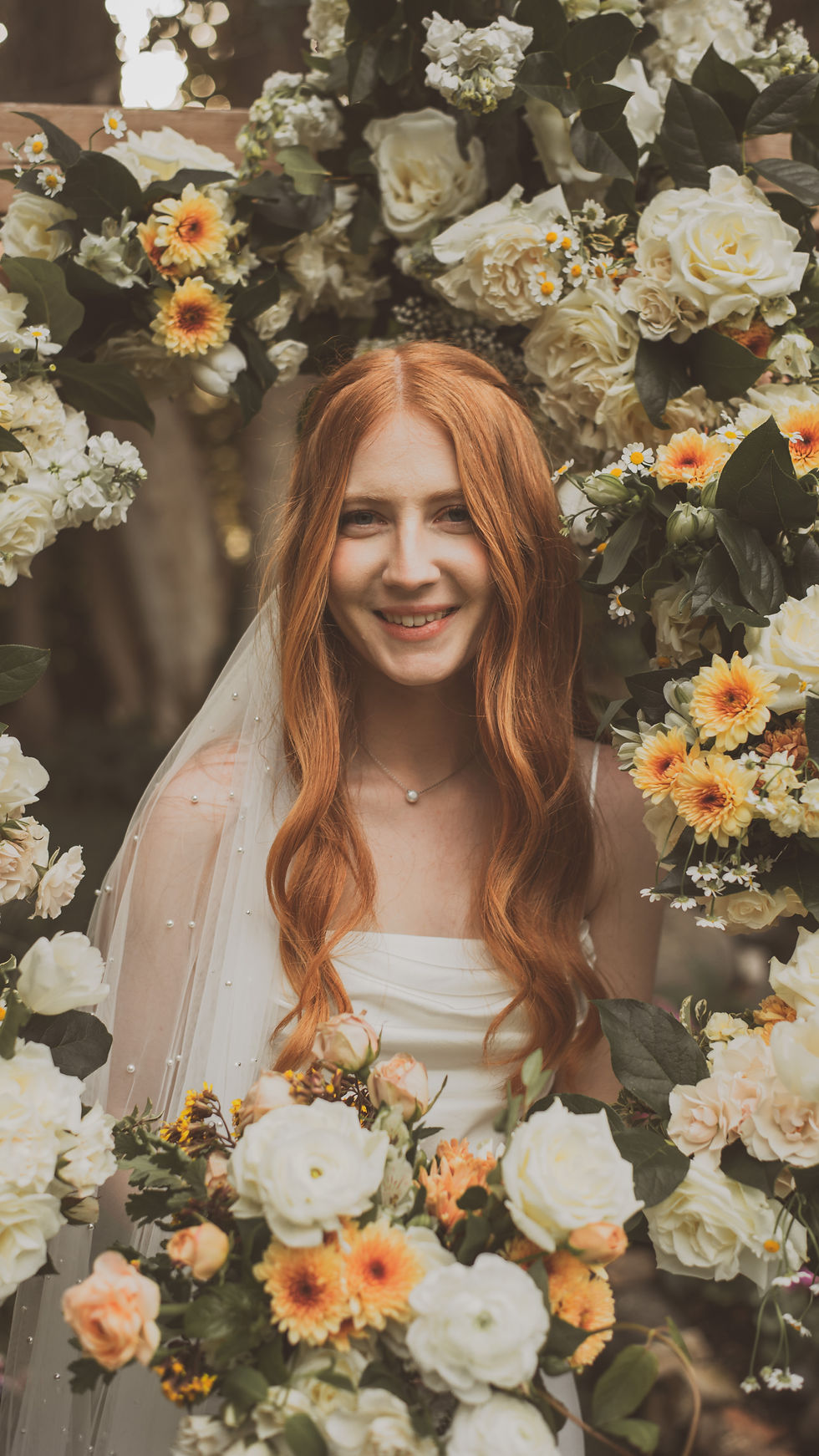 DanzaBride surrounded with white and yellow DIY'ed Boquets at Del Sol A Wedgewood Winery in Temecula Winery