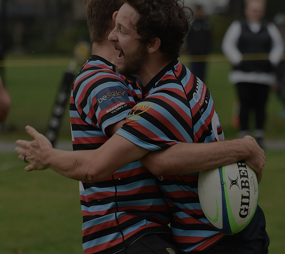 Senior Men Rugby Plaayers Hugging