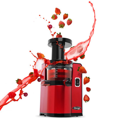 Ecommerce product photography of a red juicer with strawberry juice splash for product listings.