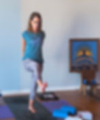 Yoga teacher, Cheryl Davenport, is focused as she guides her students into a one-legged tree pose variation during the Rise-n-Flow class at Eastern Sky Co-Op in Bridgeton, NJ, on Saturday, Sept. 20, 2025. (Ahmad Graves-El)