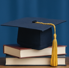 Graduation cap on books: Education success