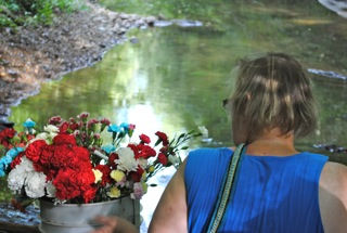 Teresa the flowers and Lynch River.jpeg