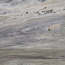 Exotic Brazilian Marble with blue tones, Polished Portinari Marble slab showcasing a bright white background with subtle and delicate gray veins softly weaving across the surface. The glossy finish enhances the marble’s smooth texture and natural luminosity, making it an elegant and refined choice for kitchen countertops, bathroom vanities, flooring, backsplashes, and decorative wall panels. This marble’s clean and understated appearance adds brightness and timeless sophistication to modern, transitional, and classic interior designs.