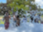 Kids playing in foam during foam party.