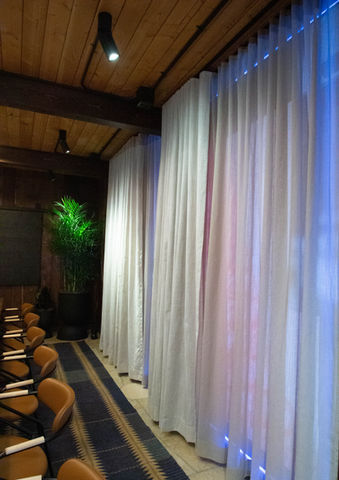 High-end sushi bar in Cherry Creek, CO. Uchiko is part of the Uchi franchise. this remodel features warm wooden accents as well as sheer and privacy draperies. 