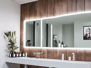 a modern studio space with sink space over looking central London used for beauty and well