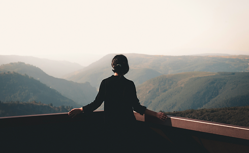 Woman being directed by a trauma-informed breathwork facilitator and somatic life coach_