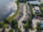 Drone photography of residential buildings by a lake